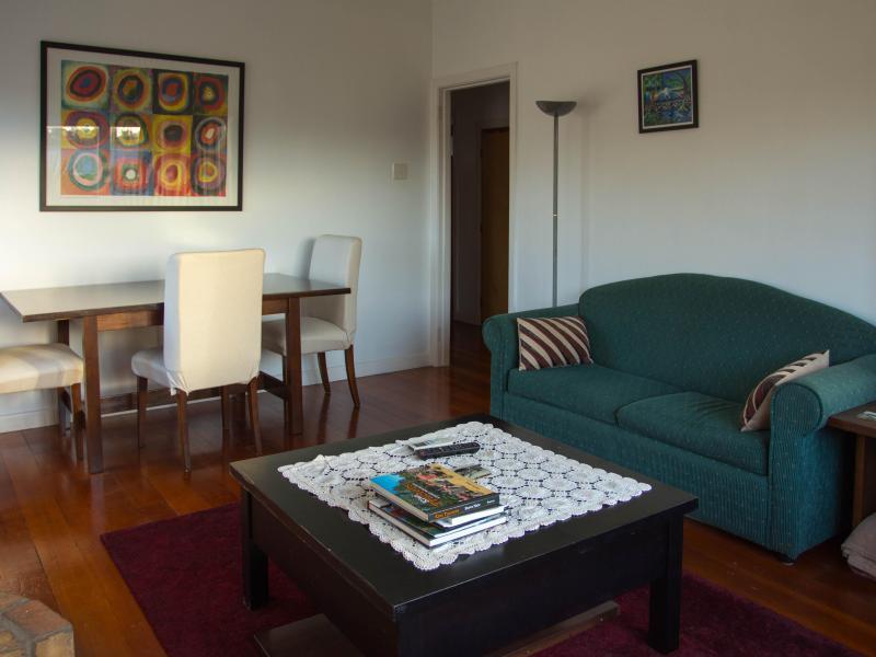 lounge. Netflix on 55 inch TV, heat pump and open fire