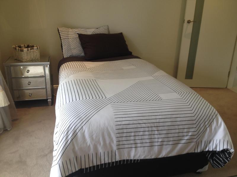 single king size bed, bed side table with draws, wadarobe with mirrors desk & chair & fully carpeted