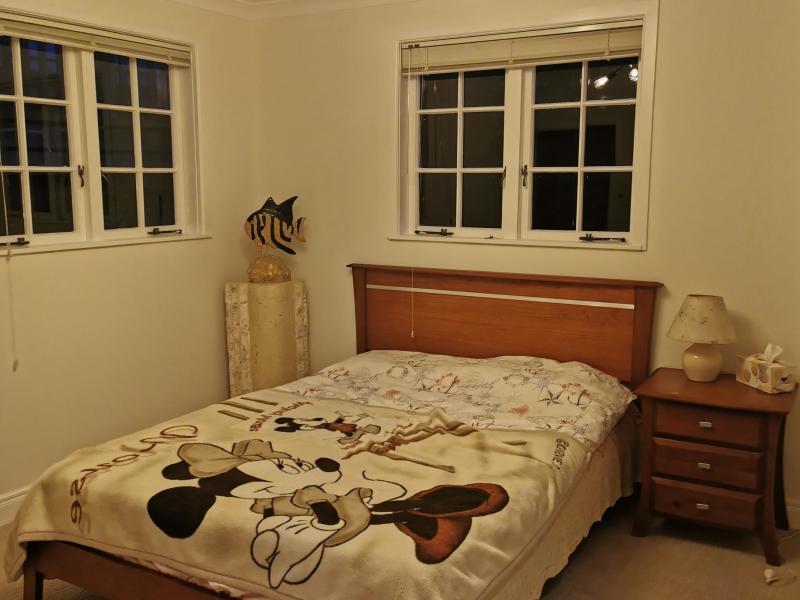 Sunny big double bedroom with a queen size bed